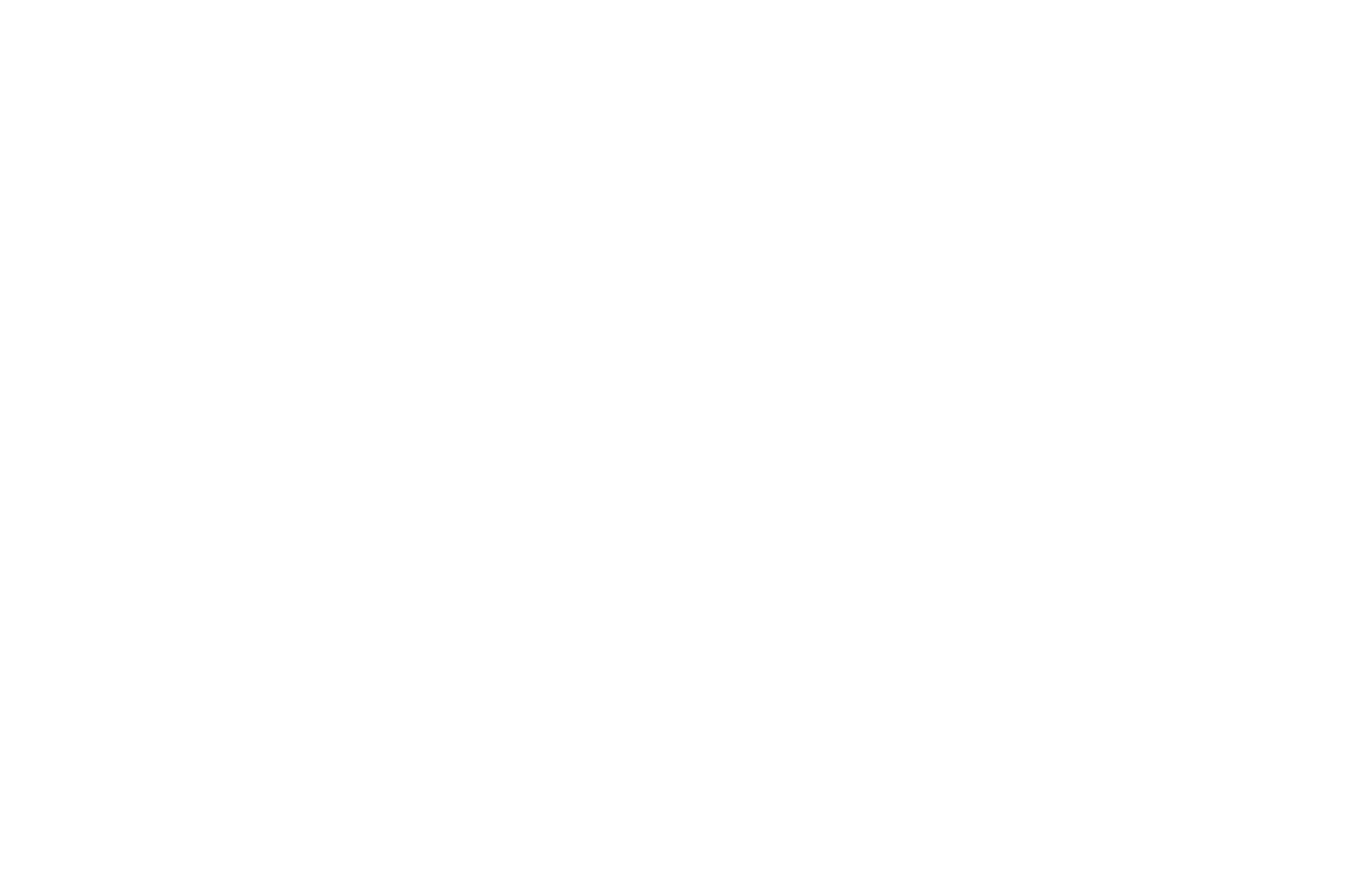 Close-up of a coiled snake on a dark background.