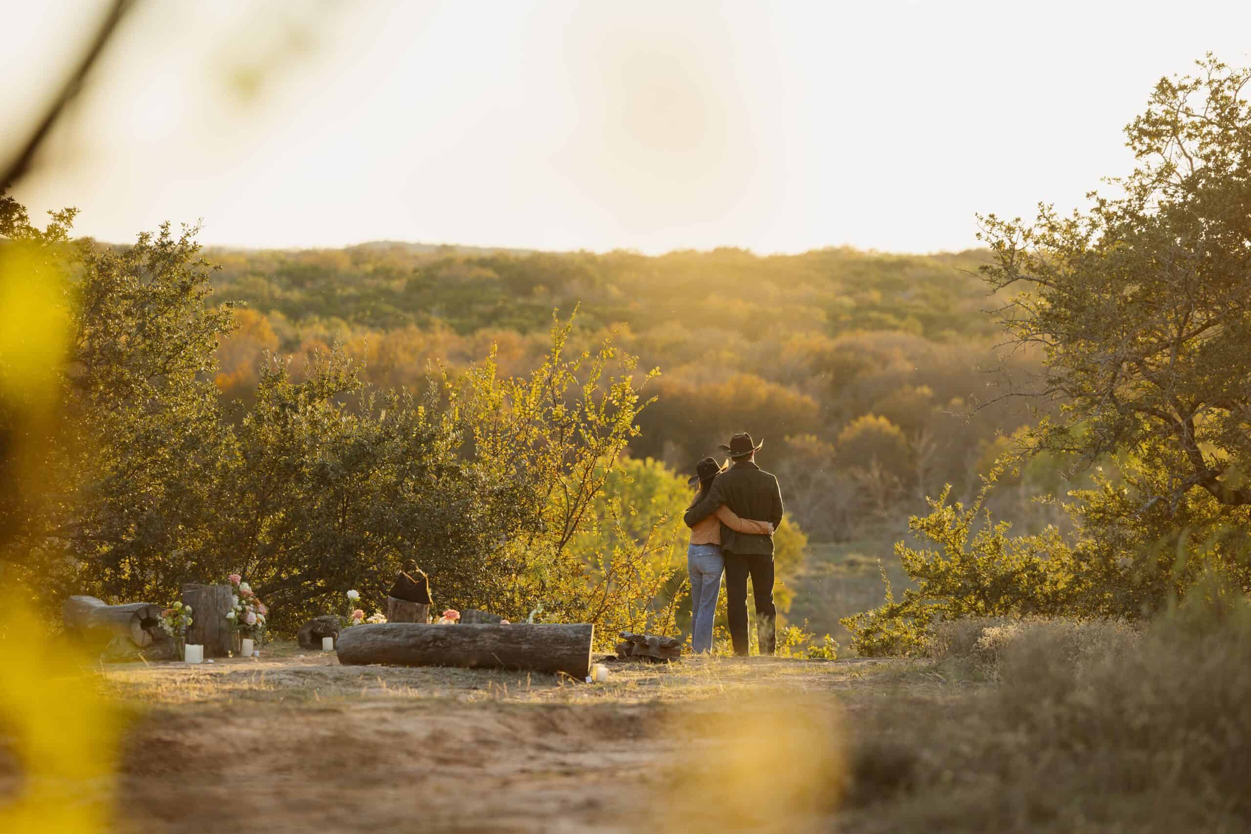 Couple enjoying sunset at Wildcatter Ranch in Texas.